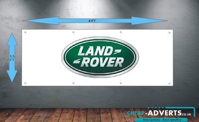 A Land Rover car garage sign Stock Photo - Alamy