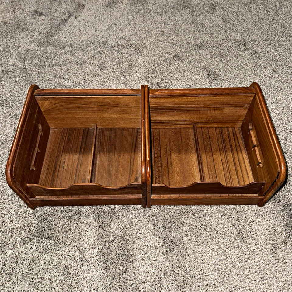 Genuine mid-century teak roll-top organizers — the kind of tactile, warm-wood desk piece that modern flat-pack furniture will never replicate.