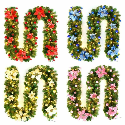 Ghirlande, corone e fiori natalizi rossi