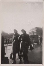 WW2 Photo of 3 Soldiers Walking Past Barracks Buildings