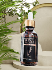 Deeply nourishing hair oil formula blends premium botanicals Oils