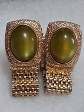 Swank mesh wrap around cufflinks, green moonglow cabochon stone, gold-tone...