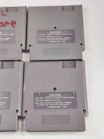 Lotto 4 giochi Nintendo NES Tecmo Bowl Top Gun Double Dragon 2 e Tom Sawyer TESTATI