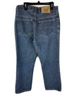 Blue AX Armani Exchange J40 women’s short regular bootleg jeans with two back pockets and branded leather patch on waistband.