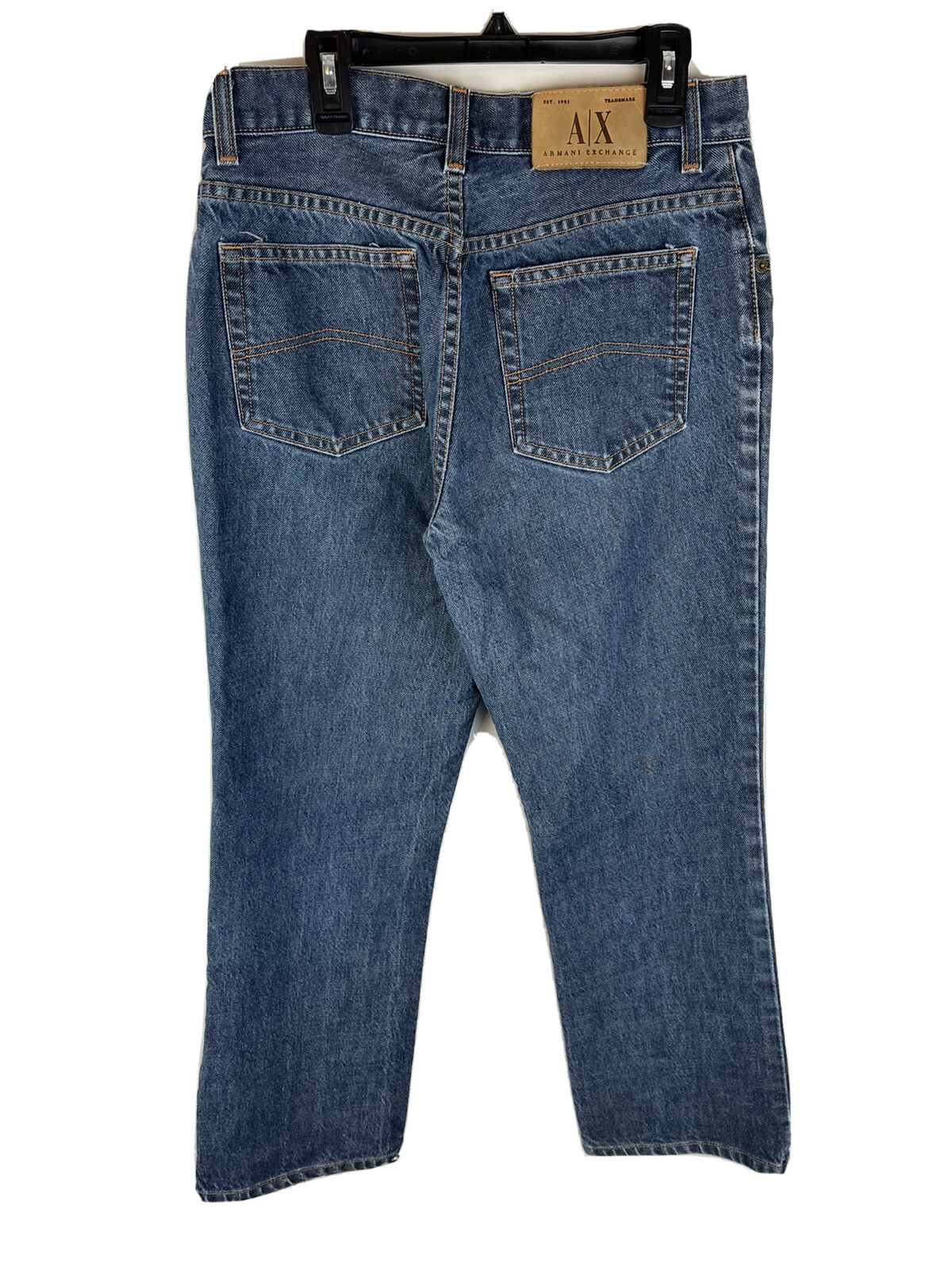 Blue AX Armani Exchange J40 women’s short regular bootleg jeans with two back pockets and branded leather patch on waistband.