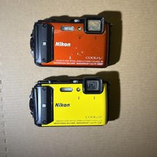 Aw130 Nikon Coolpix Lot Of 2 Orange And Yellow Untested Or Parts Rough Shape