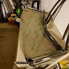 1966 - 1985 Fiat 124 Spider Windshield With Frame. 1966 - 1985 Fiat 124 Spider Windshield With Frame.