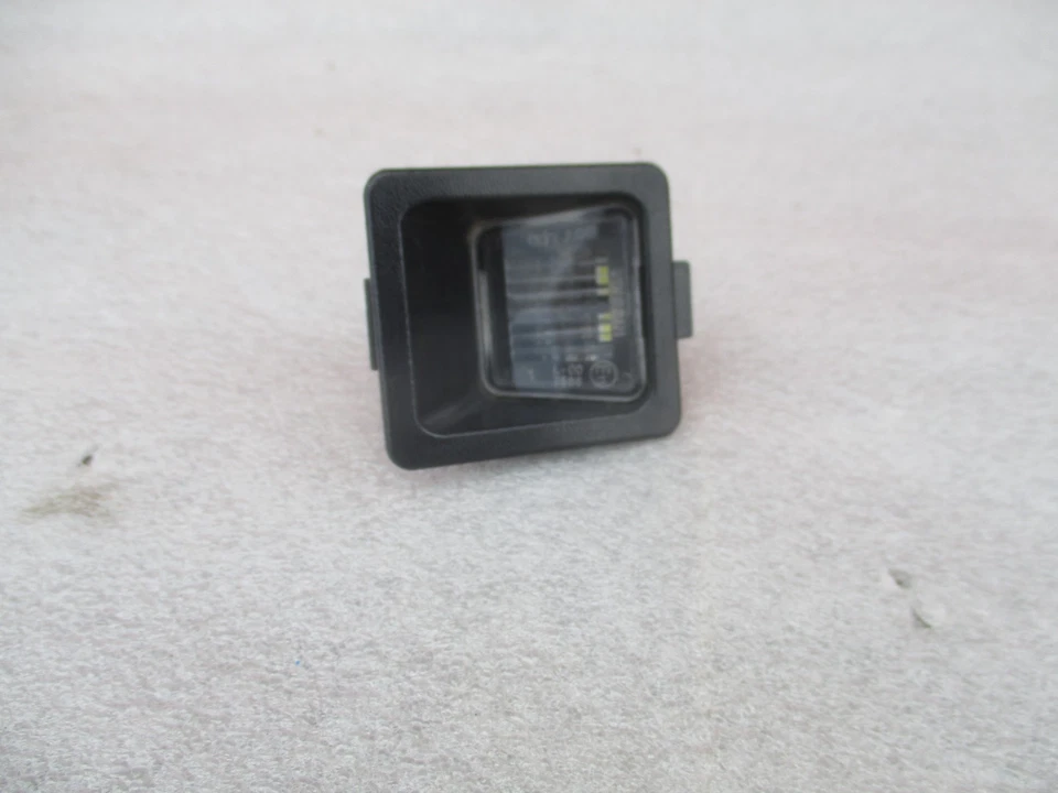 2022 - 2025 NISSAN FRONTIER LUZ MATRÍCULA TRASERA IZQUIERDA OEM LH Foto 2 de 4