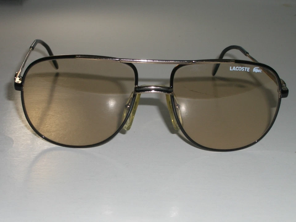 GAFAS DE SOL TRADICIONALES LACOSTE 101 57[]17 TONO MARRÓN DORADO CRISTAL FOTOCROMÁTICO Foto 3 de 4