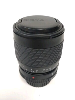 Sigma UC Zoom 70-210mm 1:4-5.6 für Minolta mit Kappen