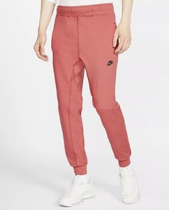 nike women's sportswear tracksuit joggers rust pink