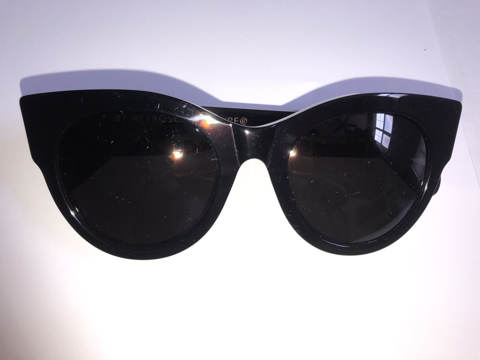 super black and gold sunglasses
