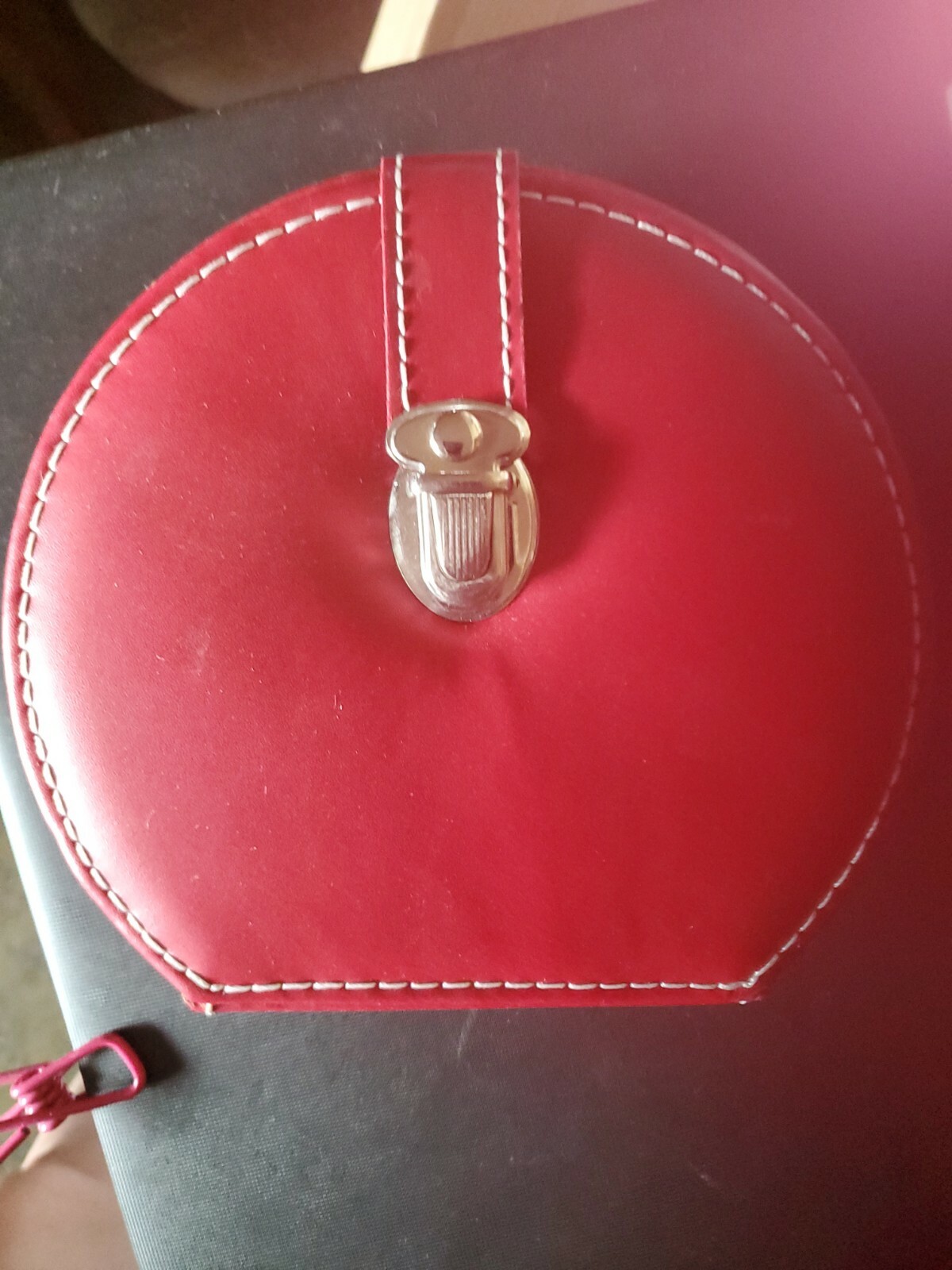 Red Travel Jewelry Organizer with Strap and Button Slide Closure-image