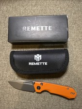 Remette Rhino Rndg3 Orange G10 D2 Button Liner Lock Folding Knife
