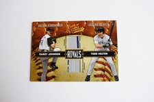 2004 Donruss Leather & Lumber Rivals Relic RANDY JOHNSON / TODD HELTON #032/250