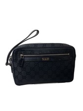 Borsa pochette Gucci nera modello GG design vintage con usura e danni interni