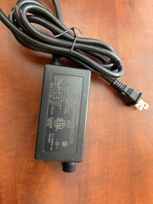 Twinkly strings power supply - 24vdc 2.0a U.S. plug IP67 mounting screw loops.