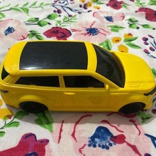 Small Yellow Battery-Operated Toy Car   Fun and Fast for Kids New