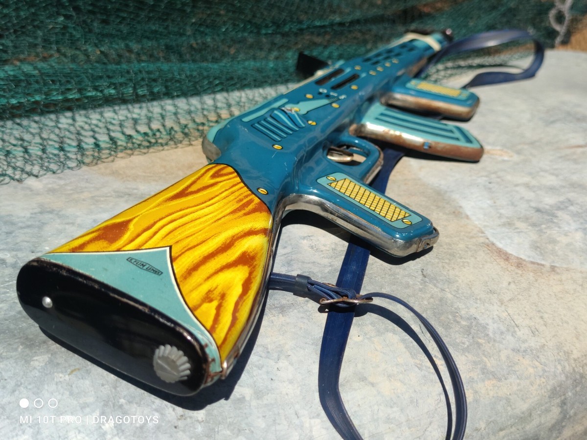 VINTAGE MACHINE GUN AK-47 TIN TOY BATT. OPERATED 58CM