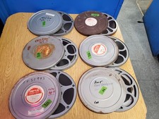 16mm Package Deal of 11 complete short subjects with reels and cans-No Vinegar