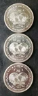Lot of Three 1986 1oz Silver World Trade Unit Rounds