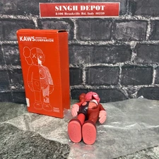 KAWS Companion Flayed Open Edition Vinyl Figure | 8" Burgundy/Pink