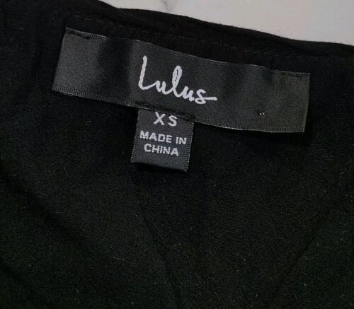 Minifalda LuLus Bubbly Vibe negra blanca dorada lentejuelas talla extra pequeña forrada - Imagen 4 de 8