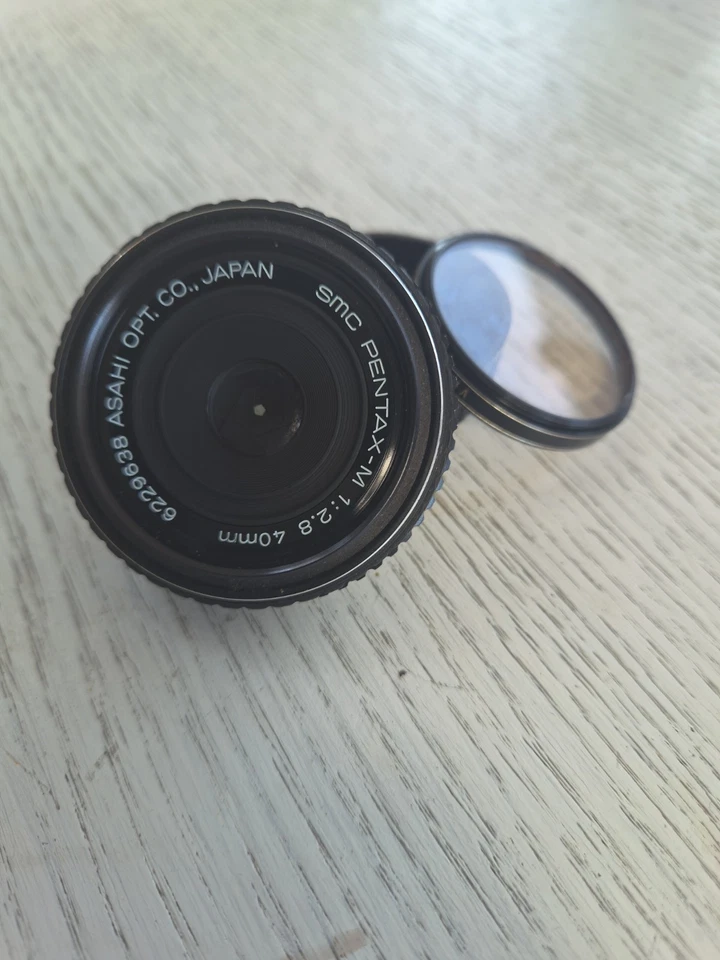 Objectif Asahi SMC Pentax - M "pancake" f/2,8 - 40mm #6204140. Monture Pentax K. - Photo 1/1