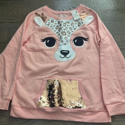 Justice Girls Size 14/16 Peach Sparkly Reindeer Sweater With Sequin Pocket - Image 1 of 4