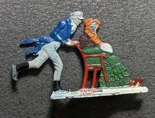 Vintage Hans Heinrichsen German Flat Lead Man Pushing Woman On Sled Winter