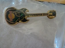 Hard Rock Cafe pin Tijuana Inverted white alien SG guitar with green alien face