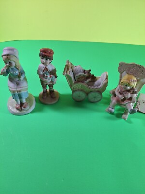 Four Figurines 3 are APPLAUSE and One Is Small Wonders Figurine 1983