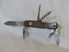 antique Swiss cross corkscrew knife and multifunction good condition