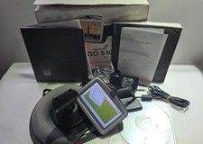 Boxed untested TOMTOM GO 510 with many accessories