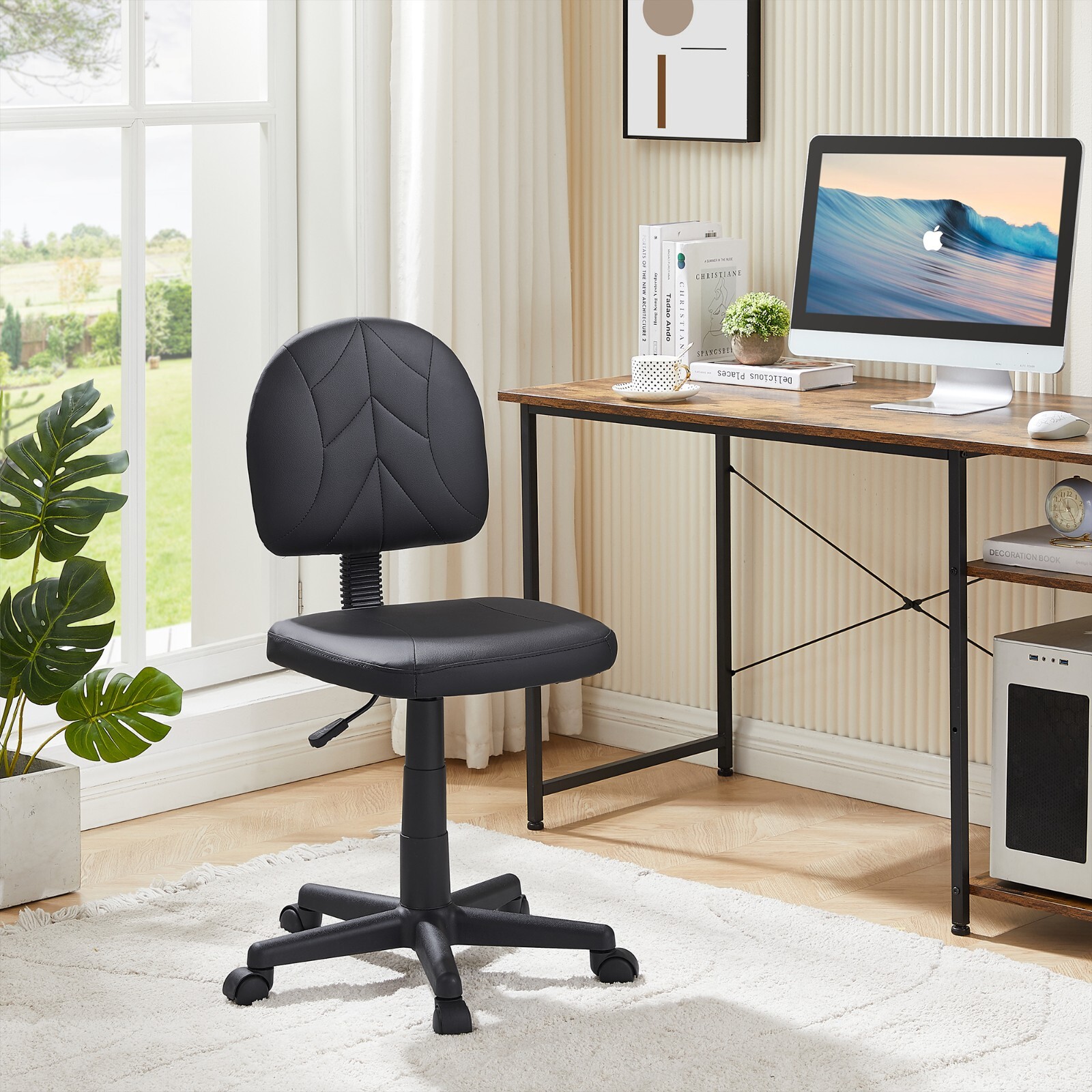 Low-back PU leather swivel computer desk chair with adjustable height and armless design  -image