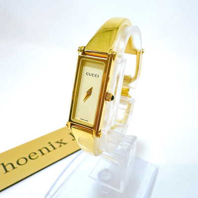 Gucci 1500L Women's Bangle Watch Quartz Gold Dial Gold