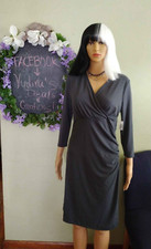 Woman's Size Medium (8) 3/4 of a sleeve Wrap V-Neck Dress