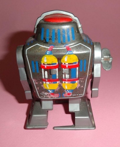 VTG YONE JAPAN MINI TIN PLASTIC CLOCKWORK SPACE ROBOT w/ ORIGINAL KEY 1960's - Picture 5 of 10