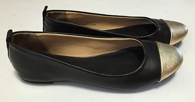 black and gold ballet flats