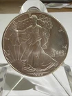 1988 AMERICAN SILVER EAGLE 1 Oz .999 Fine Silver! Comes withPlastic holder!