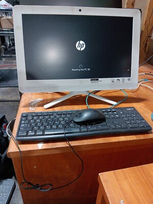 HP All-in-One - 20-c023w desktop computer. THIS SCREEN HAS DAMAGE