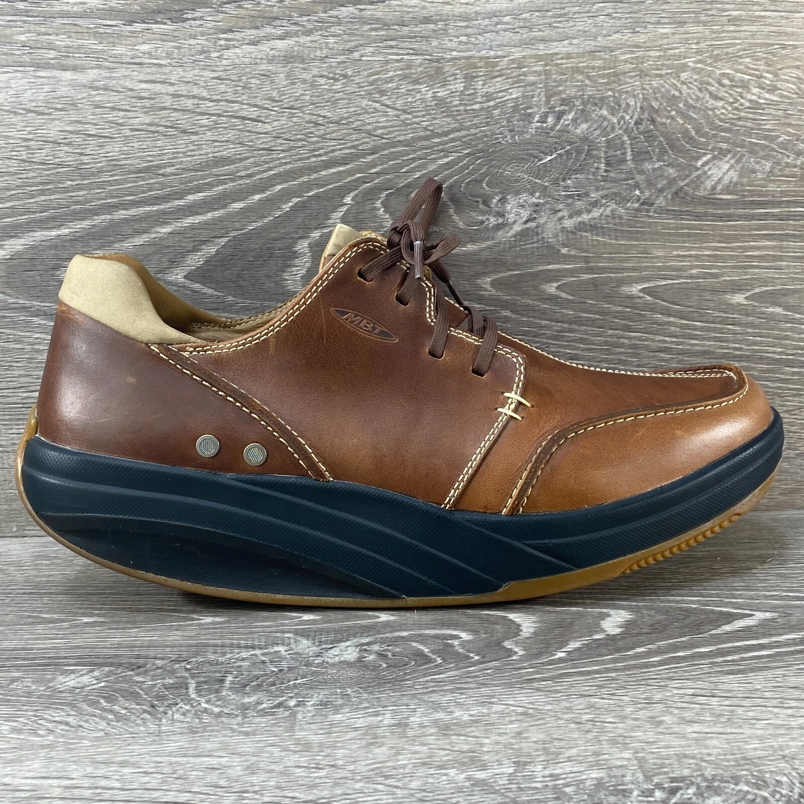 Scarpe da passeggio MBT fisiologiche marroni Tariki M pelle noce Oxford tonificanti 11