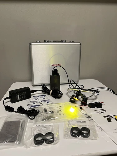 SurgiTel Loupes with Ultra LIght Optics LED Light Oakley Radar Frames and Case
