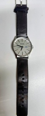 Nixon ''The Sentry '' Mens Quartz Watch With Silver Dial And Brown Leather Strap
