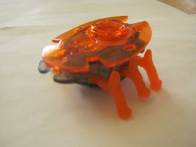 McDonald's Orange Nano Beetle Hex Bug Wind-up toy dated 2013 (010-3)