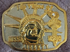 VINTAGE GOLD AND SILVER TONE 100 YEARS OF LIBERTY BELT BUCKLE WITH DIAMOND CHIP