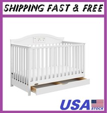 Story Convertible Crib with Drawer and Graco Premium Foam Crib Toddler Bed