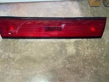 Mazda 323 Bg Sedan Rear Garnish Center Taillight Koito Genuine Nos Japan 1 Mazda 323 Bg Sedan Rear Garnish Center Taillight Koito Genuine Nos Japan 1