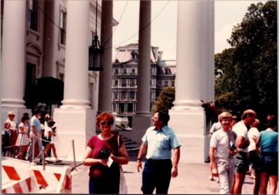Vintage Photo of Tourists at Historic Building with Iconic Columns