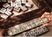 A set of court mahjong black rosewood inlaid shell mahjong